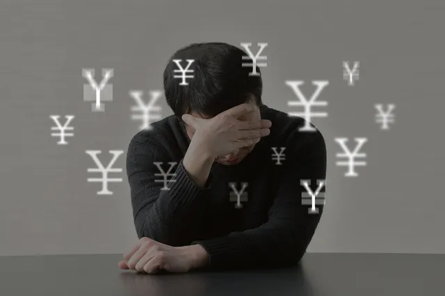 金銭トラブルに遭う男性